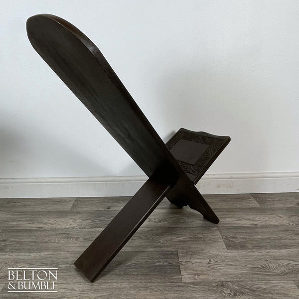 Carved African Palaver Chair – angled view showing proportions and stance