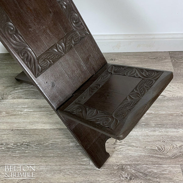 Carved African Palaver Chair – Close-up of hardware carvings and finish