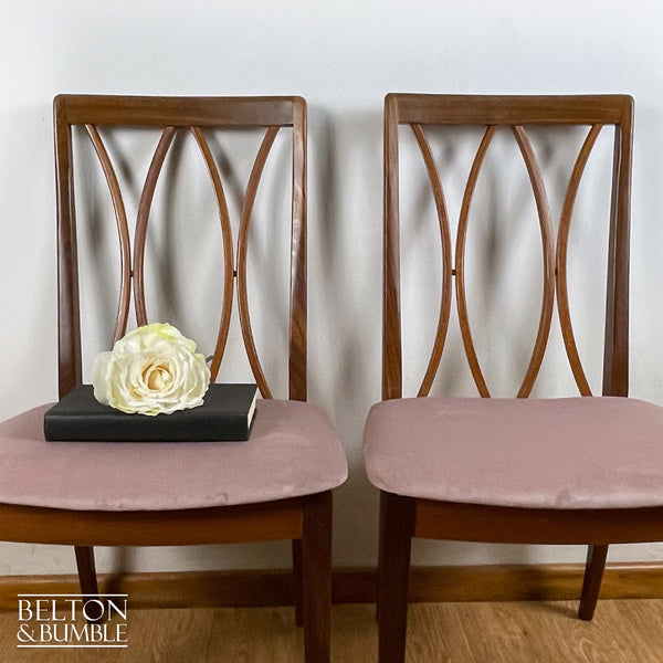 Four G Plan Curve Back Dining Chairs with Dusky Pink Velvet – Close-up of teak, dusky pink velvet seat pads