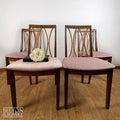 Four G Plan Curve Back Dining Chairs with Dusky Pink Velvet – Styled product shot with complementary decor to suggest scale