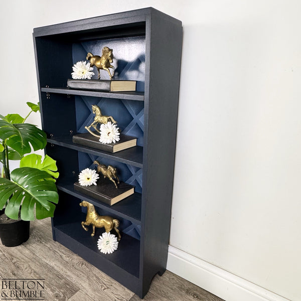 Freestanding Bookcase in Navy Blue with Adjustable Shelves — angled view showing slim profile and generous storage