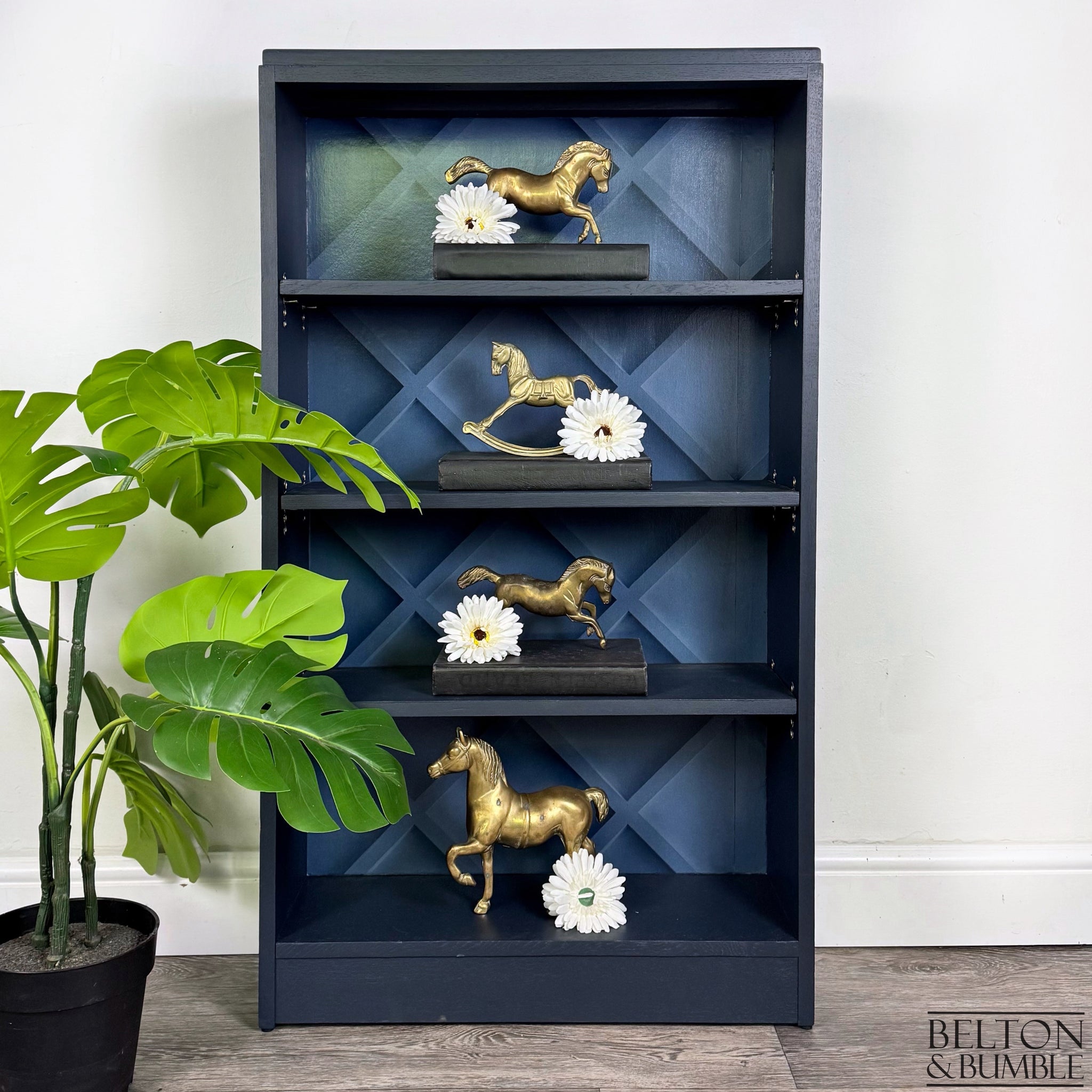 Freestanding Bookcase in Navy Blue with Adjustable Shelves — Styled product shot with books and décor in a modern interior