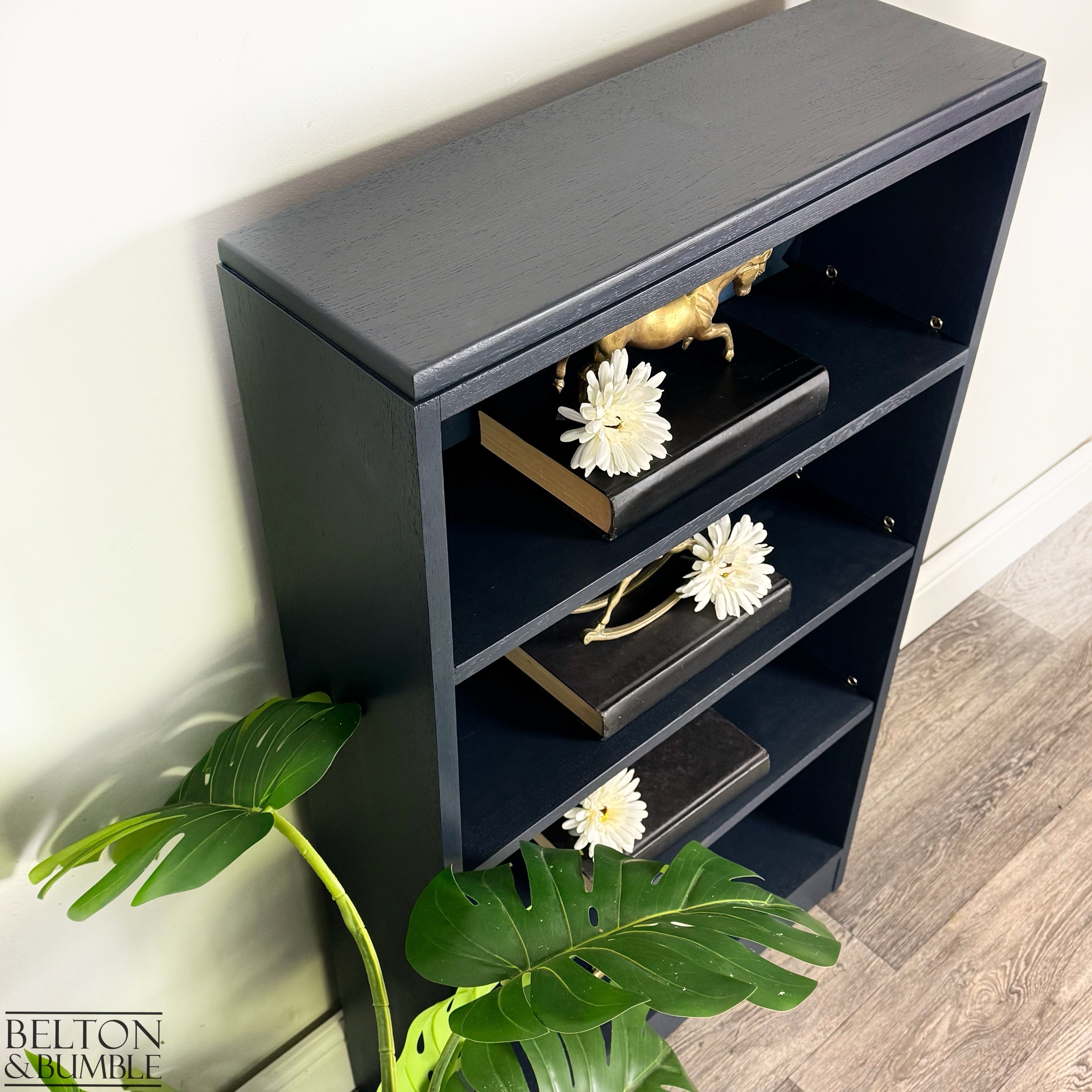 Freestanding Bookcase in Navy Blue with Adjustable Shelves — top view with adjustable shelving positions
