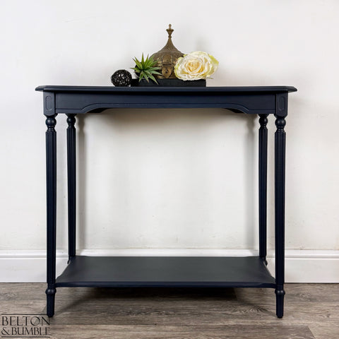Mahogany and Burr Poplar Console Table in Navy Blue – Styled product shot with complementary decor to suggest scale
