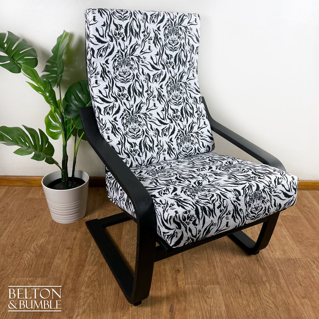 Monochrome Rocker Chair with Tiger Print – angled view showing proportions and stance