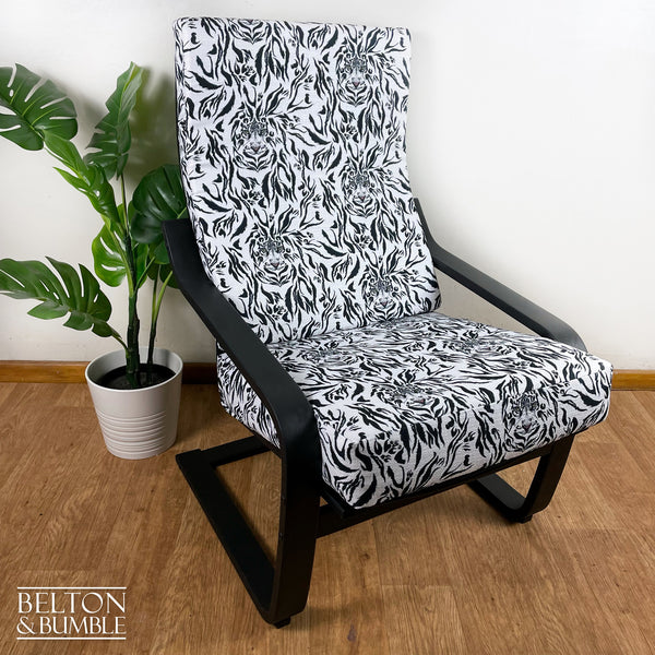 Monochrome Rocker Chair with Tiger Print – angled view showing proportions and stance