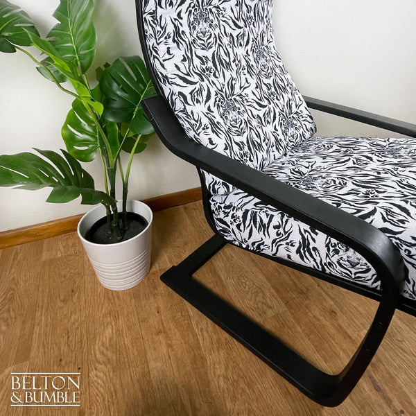 Monochrome Rocker Chair with Tiger Print – Angled profile highlighting depth, leg shape and silhouette