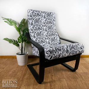 Monochrome Rocker Chair with Tiger Print – Styled product shot with complementary decor to suggest scale