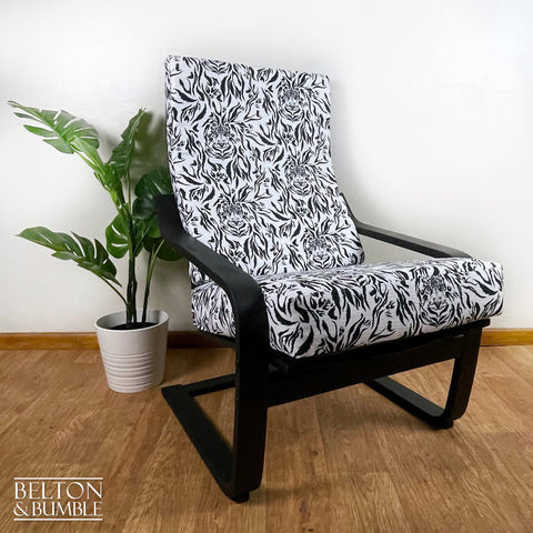 Monochrome Rocker Chair with Tiger Print – Styled product shot with complementary decor to suggest scale