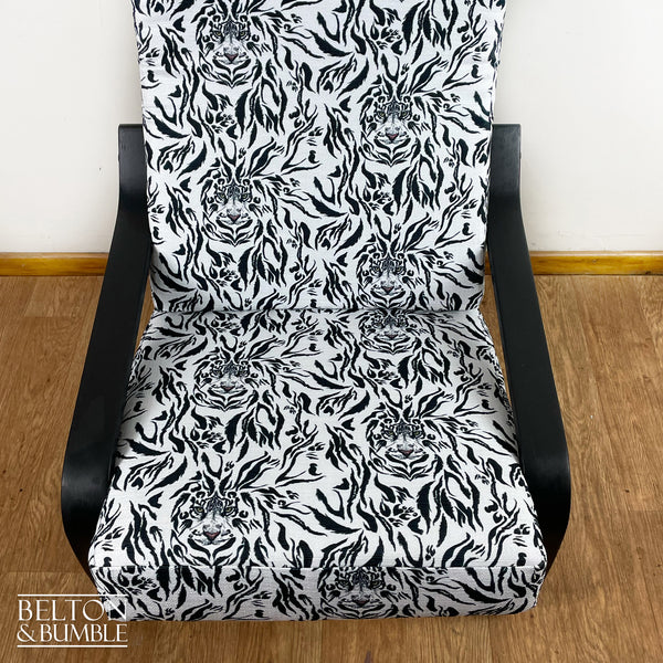 Monochrome Rocker Chair with Tiger Print – Top surface detail showing fabric