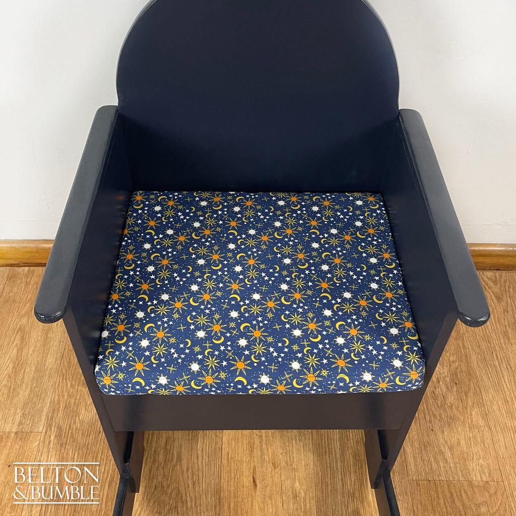 Navy Childs Rocking Chair – Close-up of wood with navy finish and cushion