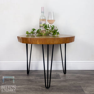 Oak Slice Gold Resin Coffee Table – Styled product shot with complementary decor to suggest scale