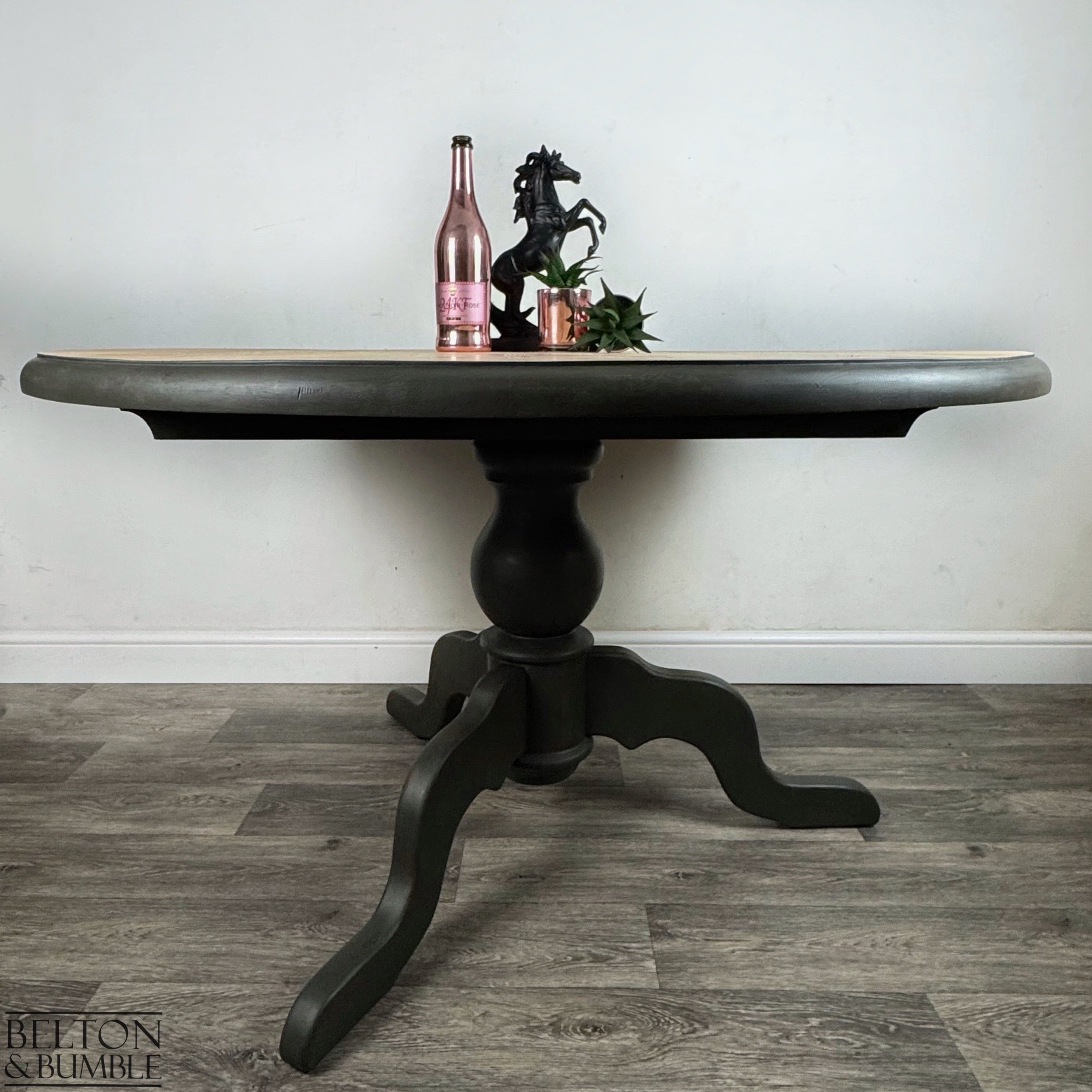 Dark grey hand-painted pedestal base with sweeping curved legs.