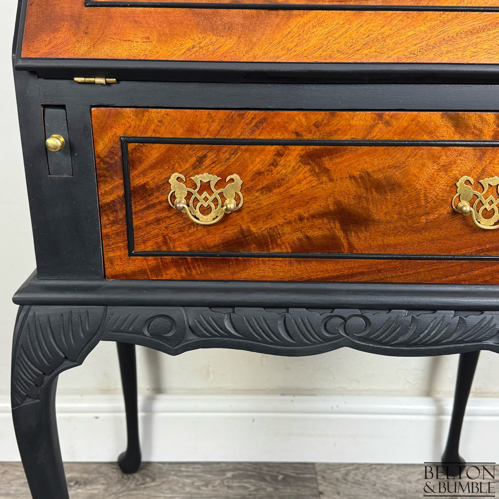 Vintage bureau with closed drawer revealing burr walnut veneer