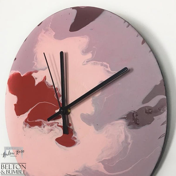 Red & Pink Vinyl Record Clock – Abstract Burst Design —  close up shot highlighting layered pour patterns