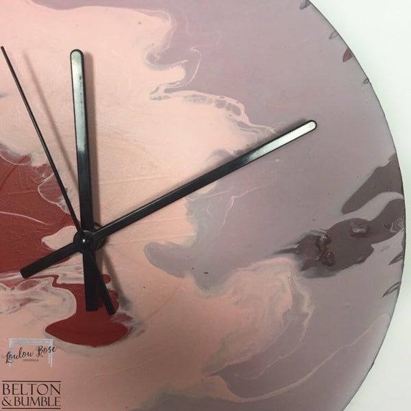 Red & Pink Vinyl Record Clock – Abstract Burst Design — close-up of marbling and colour transitions
