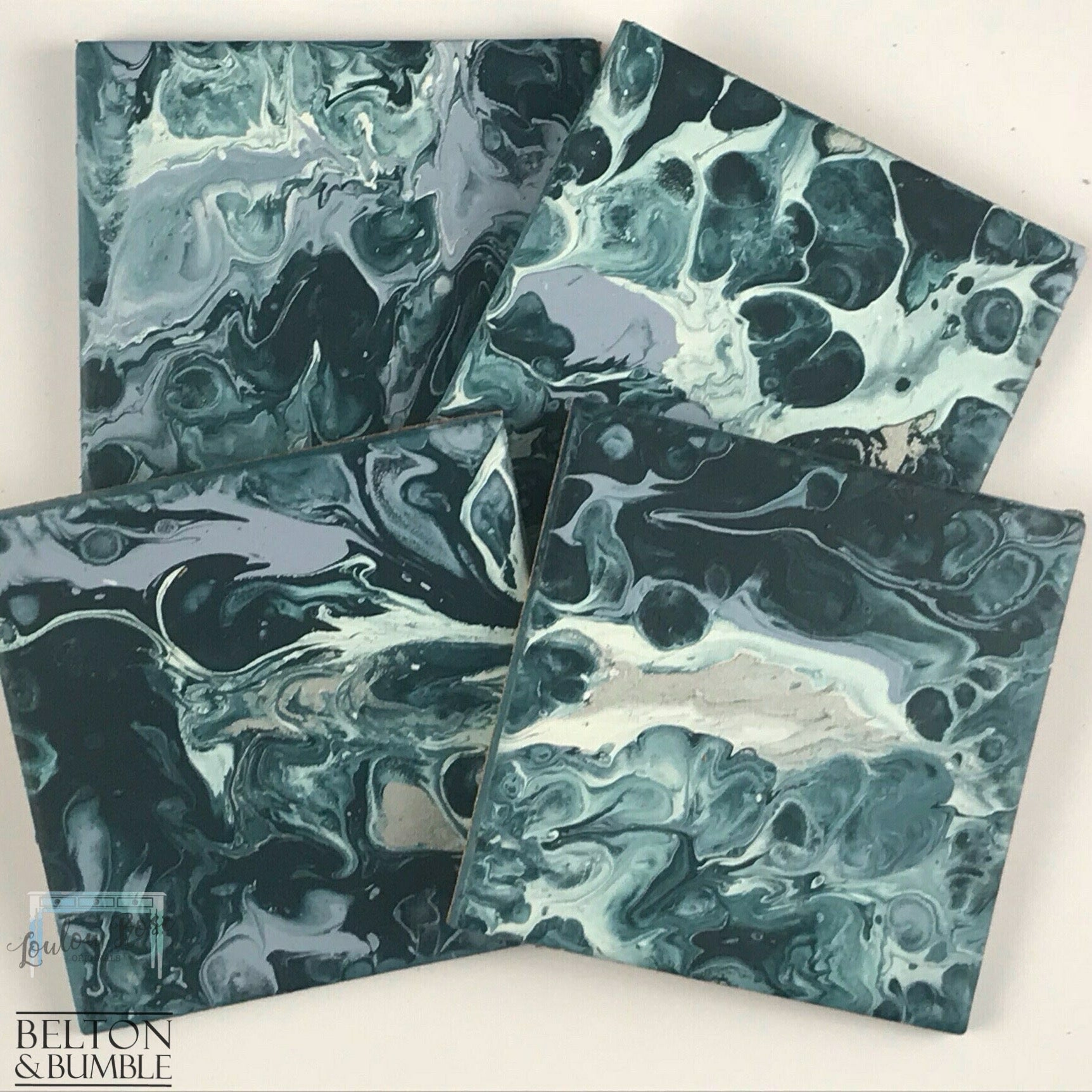 Set of 4 Blue & Silver Acrylic Pour Coasters – Modern Handmade Set — angled stack highlighting thickness and gloss