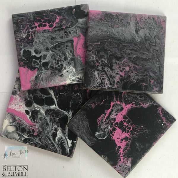 Set of 4 Pink & Black Acrylic Pour Coasters – Handcrafted Ceramic Art — angled stack highlighting thickness and gloss