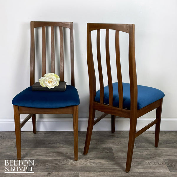 Set of Four Teak Dining Chairs with Navy Velvet – front view showing overall layout