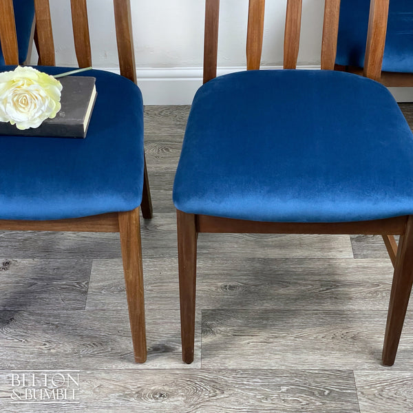 Set of Four Teak Dining Chairs with Navy Velvet – Close-up of velvet upholstered seat, wooden legs