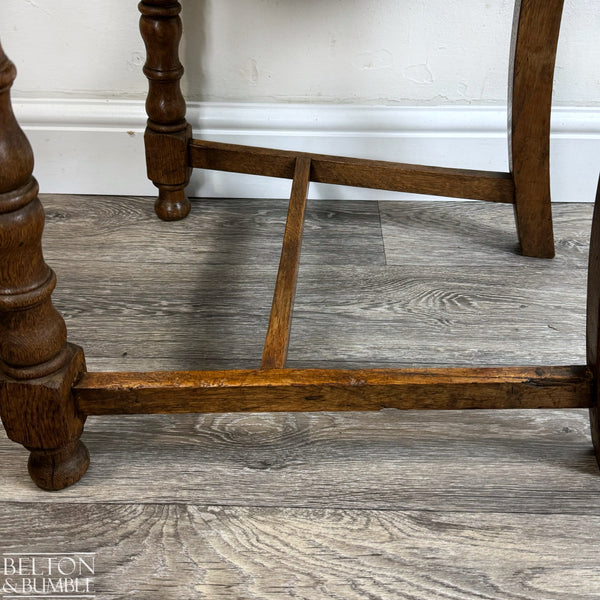 Set of Six Oak Carved Chairs Upholstered with Hand Sewn Tapestry – side view showing legs close up