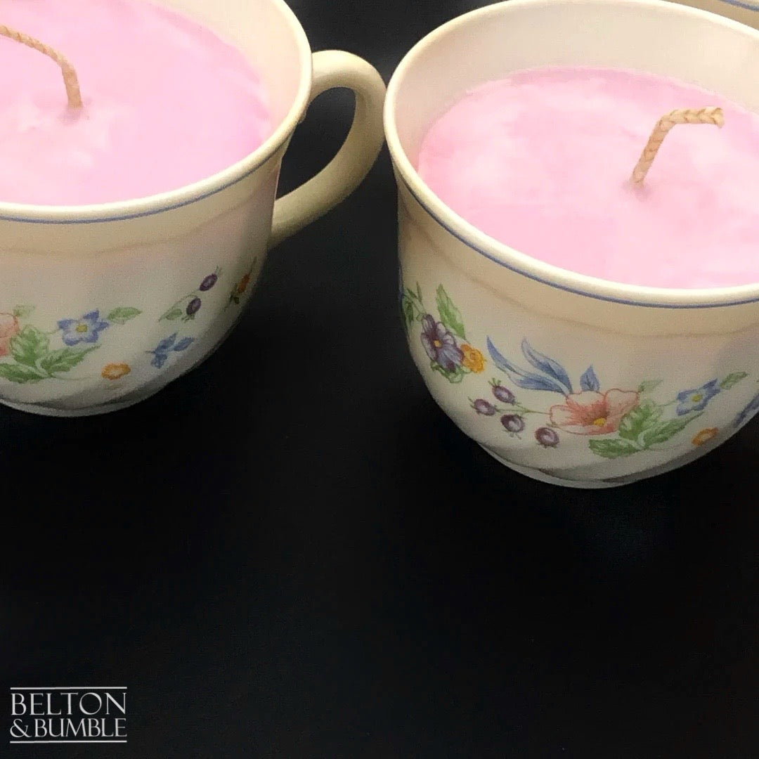 Soy Wax Vintage Teacup Candle with Orchid Scent  - Close-up of orchid-scented soy wax teacup candles with soft pink wax and vintage floral patterns.