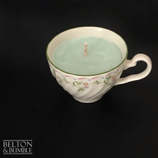 Soy Wax Vintage Teacup Candles with Green Apple Scent - Close-up of a hand-poured green apple scented soy wax candle in a floral vintage teacup with a natural cotton wick.