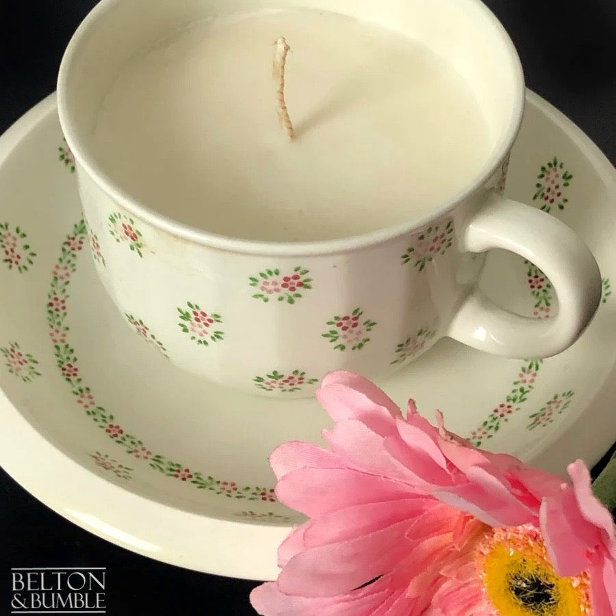 Soy Wax Vintage Teacup and Saucer Candle with Vanilla Scent - Hand-poured vanilla-scented soy wax candle in a vintage teacup and saucer with a pink flower accent.
