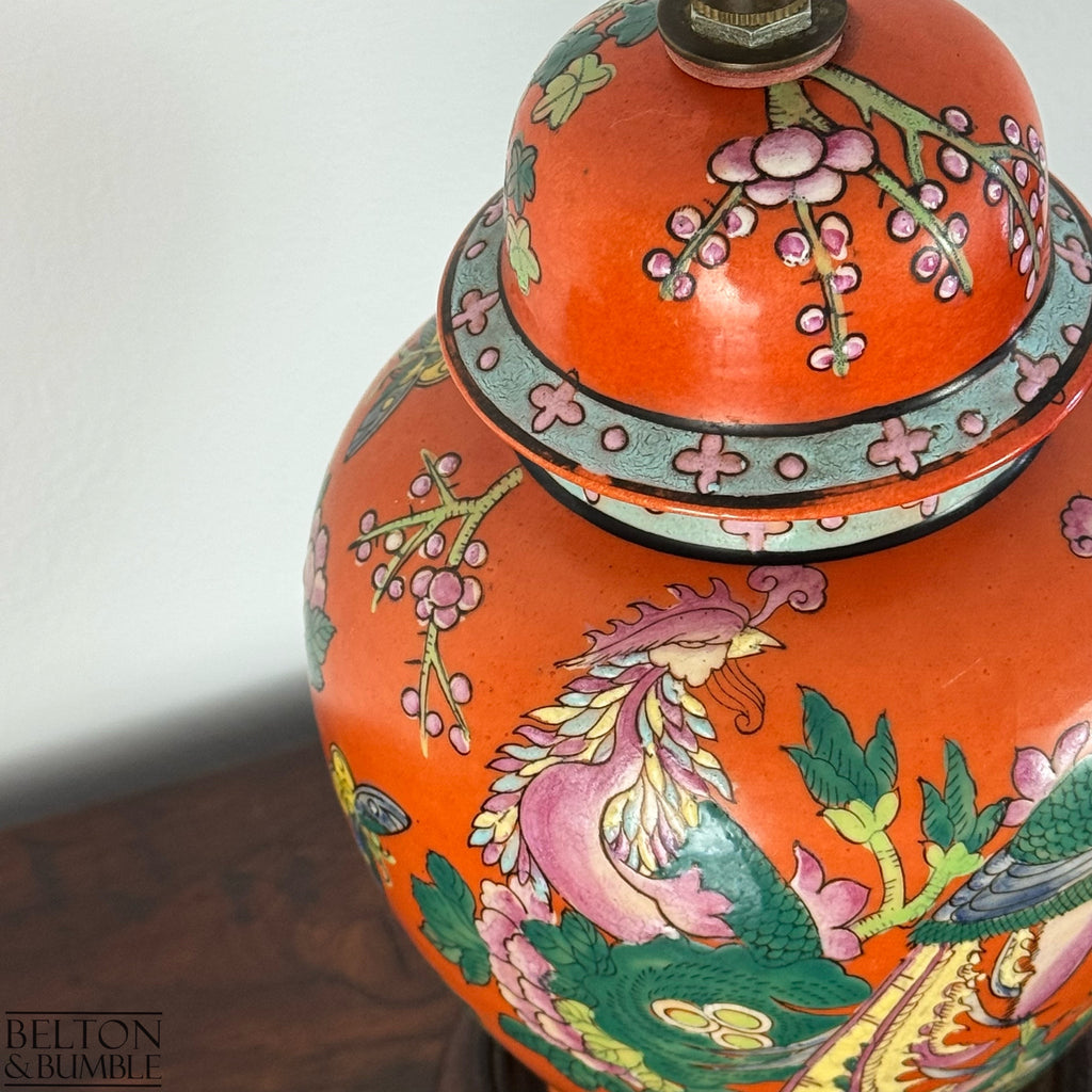 Vintage Oriental Ginger Jar Table Lamp  – Decorative orange vase with floral and bird designs on a plain background