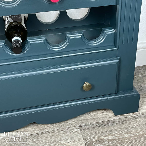 Wine Bottle Rack Cabinet in Blue – Close-up of wood with blue finish and texture