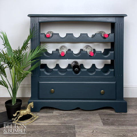 Wine Bottle Rack Cabinet in Blue – Styled product shot with complementary decor to suggest scale