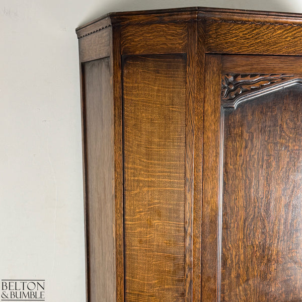 Close-up of the oak grain and panel detailing on the side of the Edwardian wardrobe.